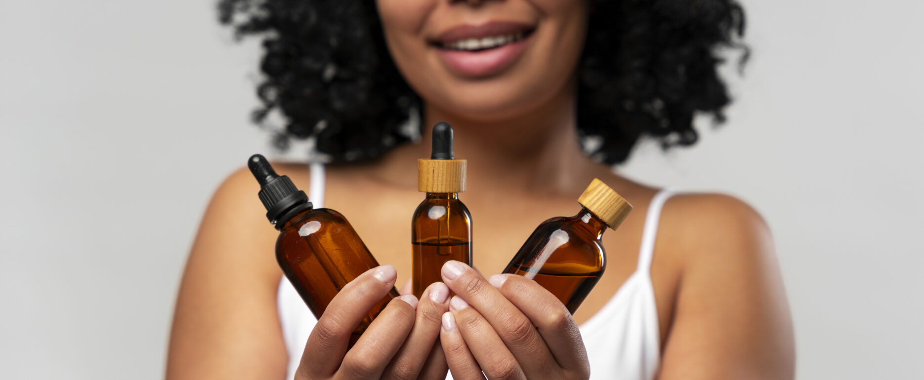 portrait young beautiful woman with beauty serum
